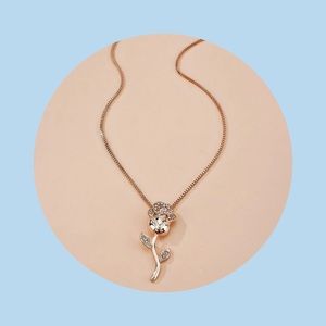 Rose gold rose necklace